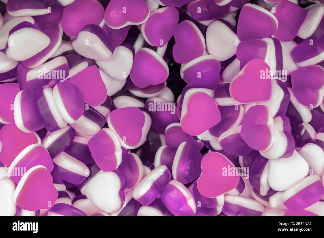 Pink reddish background heart hi-res stock photography and images - Alamy