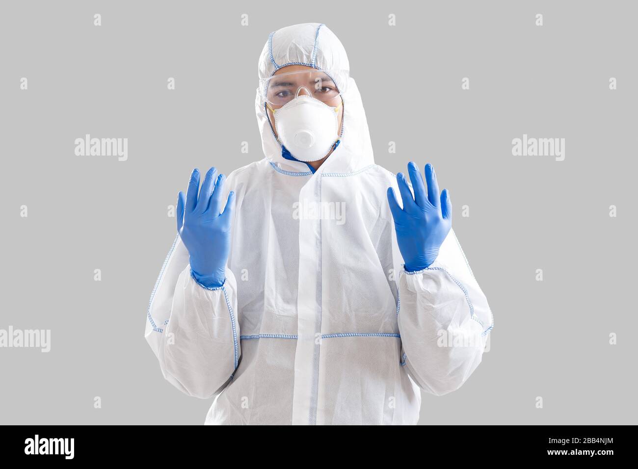 Man in protective gloves hi-res stock photography and images - Alamy