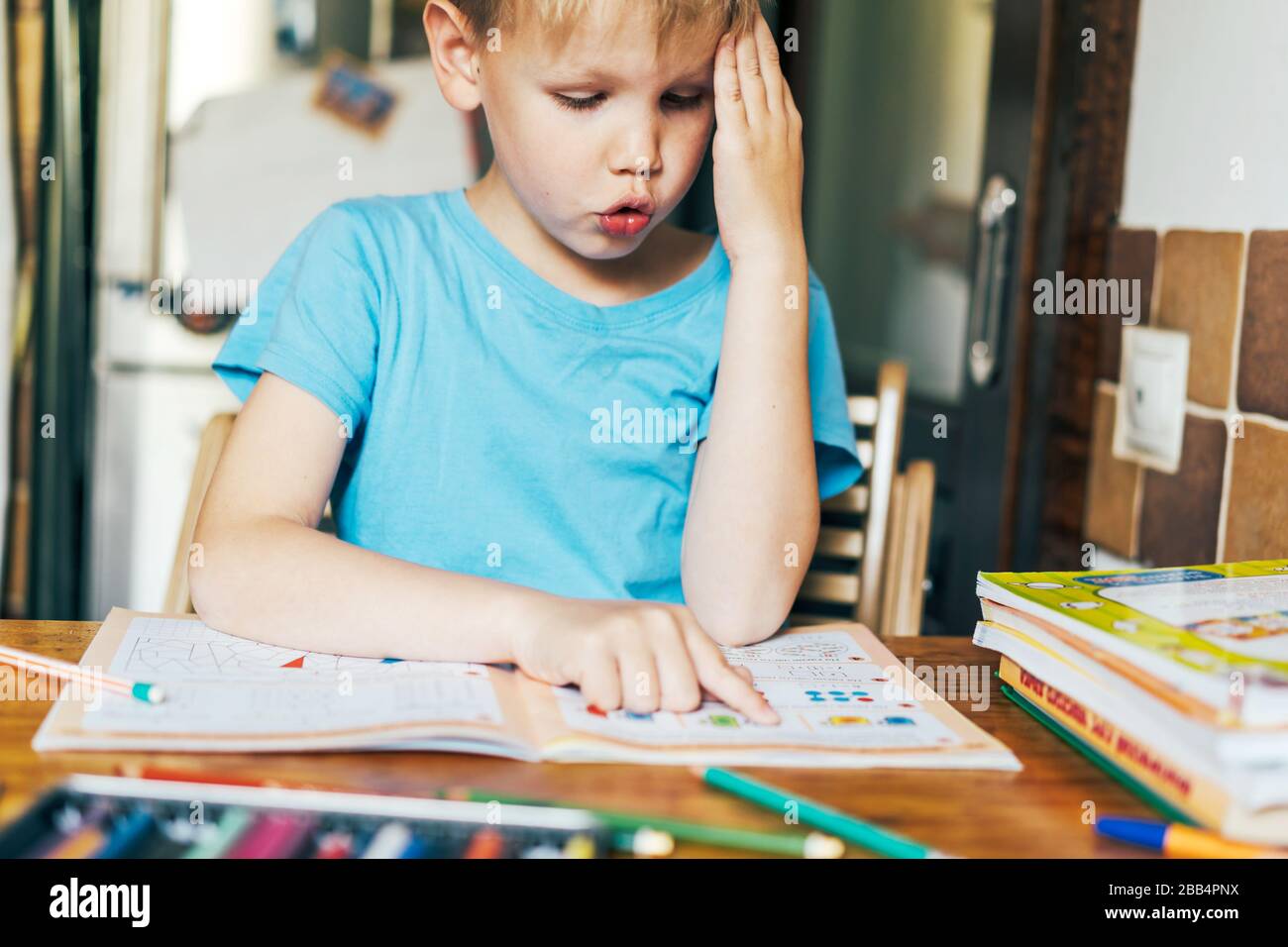 child does homework Stock Photo Alamy