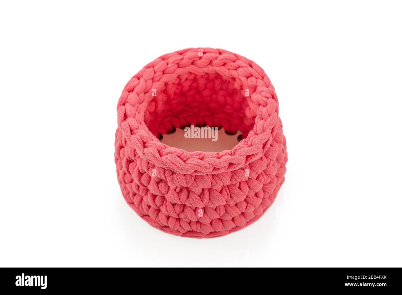 knitted cosmetic bag on white Stock Photo