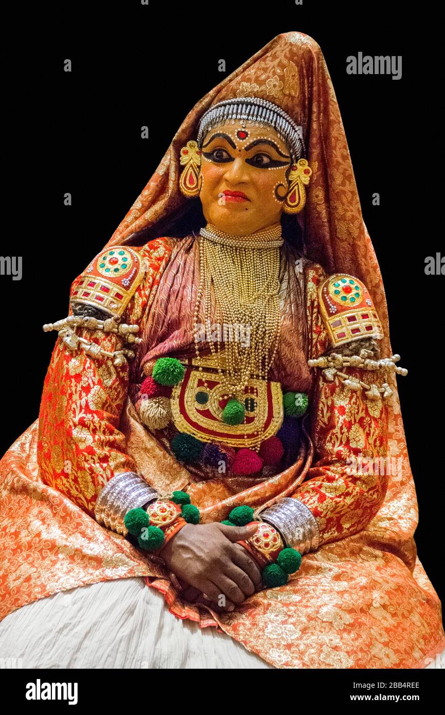 Traditional Kathakali Hindu performer isolated on black background, performance art in Kerala Stock Photo