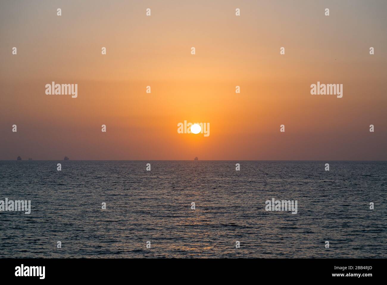 sunset sunrise on the sea Stock Photo - Alamy