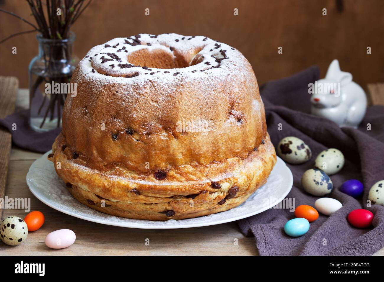 Reindling, german and austrian easter cake in easter decoration. Rustic style. Stock Photo