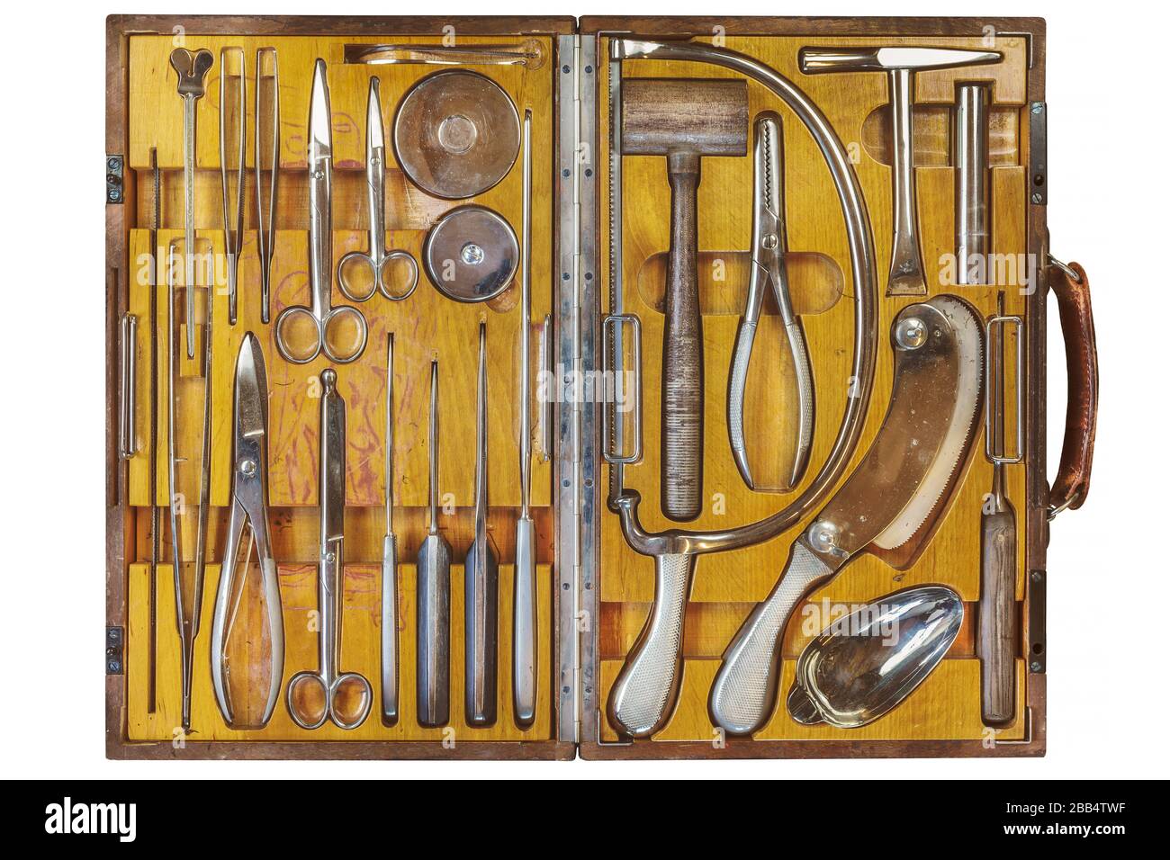 Ancient doctor wooden case with surgical equipment isolated on a white background Stock Photo