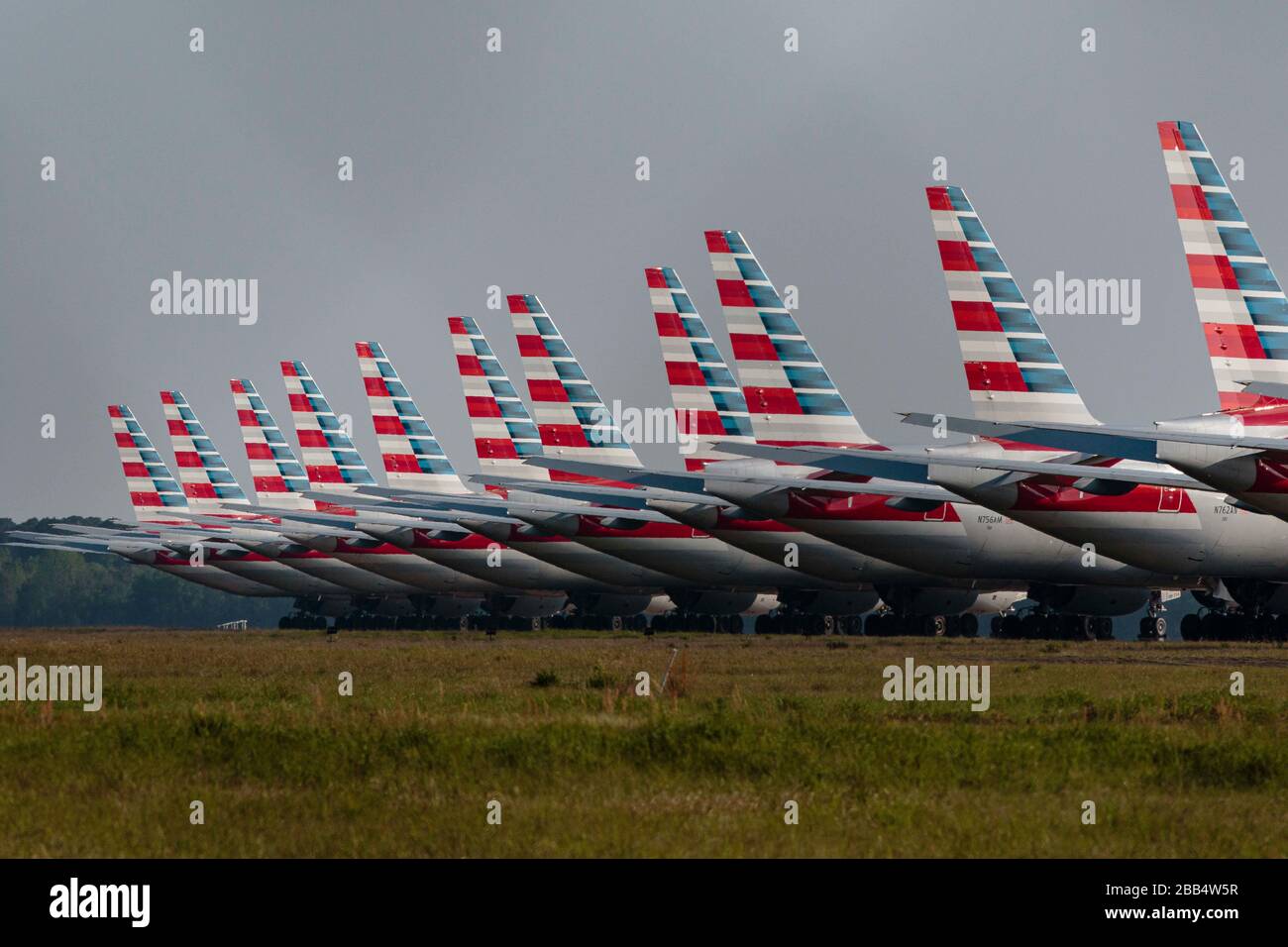 Mobile, Alabama, USA. 25th Mar, 2020. A group of American Airlines 737