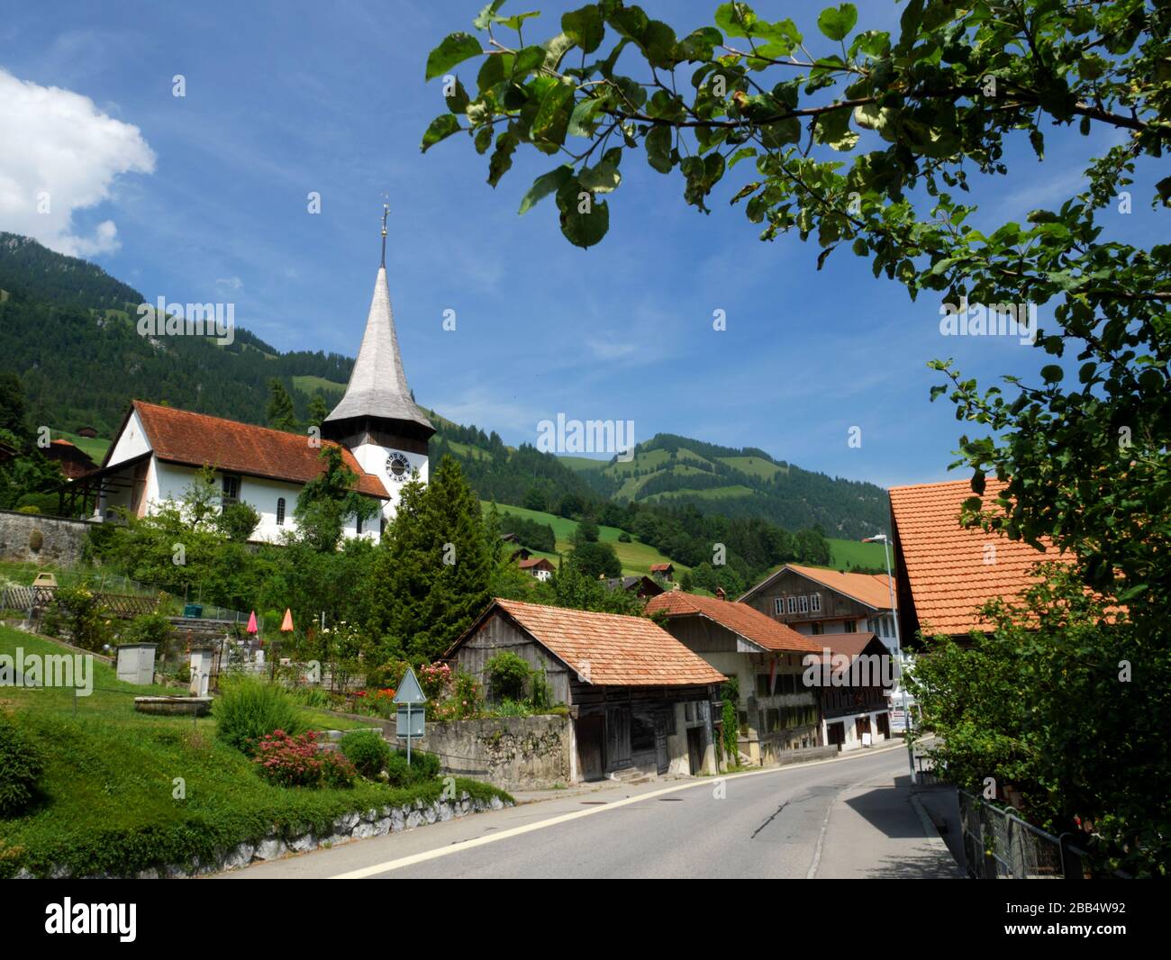 The church of St Michael at Erlenbach-im-Simmental, Switzerland. The village was the birthplace of Jokob Amman, founder of the Amish movement. Stock Photo