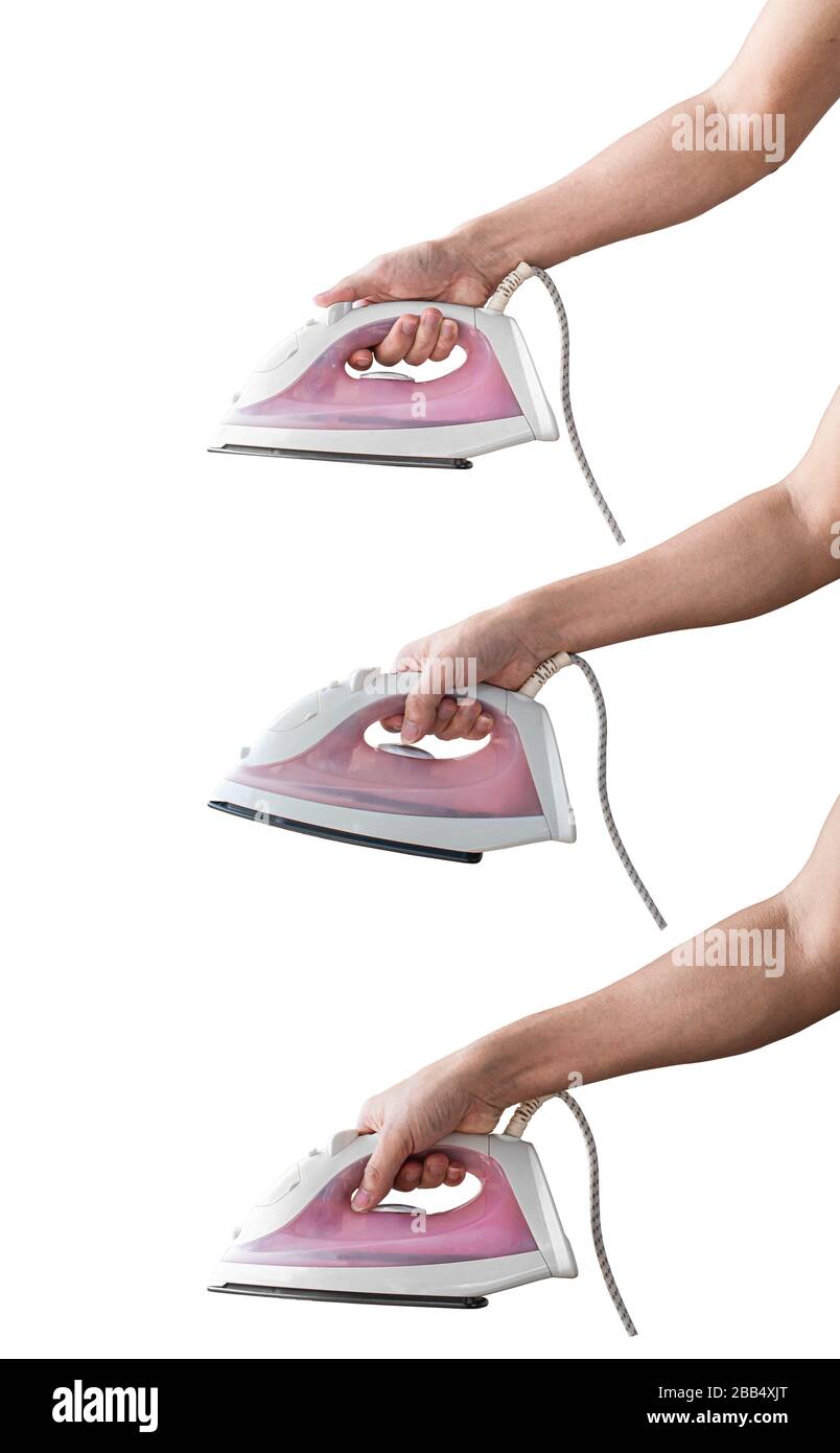 Set of hand holding electric iron, Isolated on white background with clipping path. Stock Photo