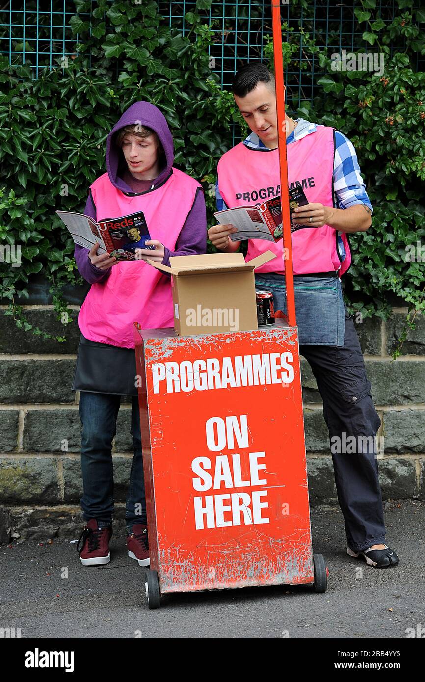 Programme Seller Programme sellers at Oakwell Stock Photo - Alamy