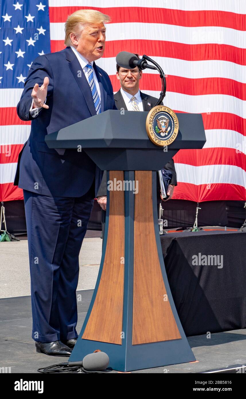 U.S President Donald Trump delivers remarks during a visit to see off the Military Sealift Command hospital ship USNS Comfort at Naval Station Norfolk March 28, 2020 in Norfolk, Virginia. The Comfort is deploying to New York in support of the nation’s COVID-19 response efforts. Stock Photo