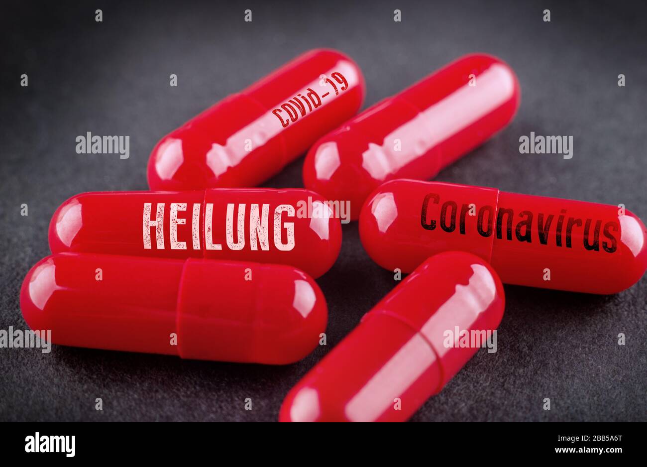 Concept picture of a cure for Coronavirus Covid-19. Heilung means cure in german. Stock Photo