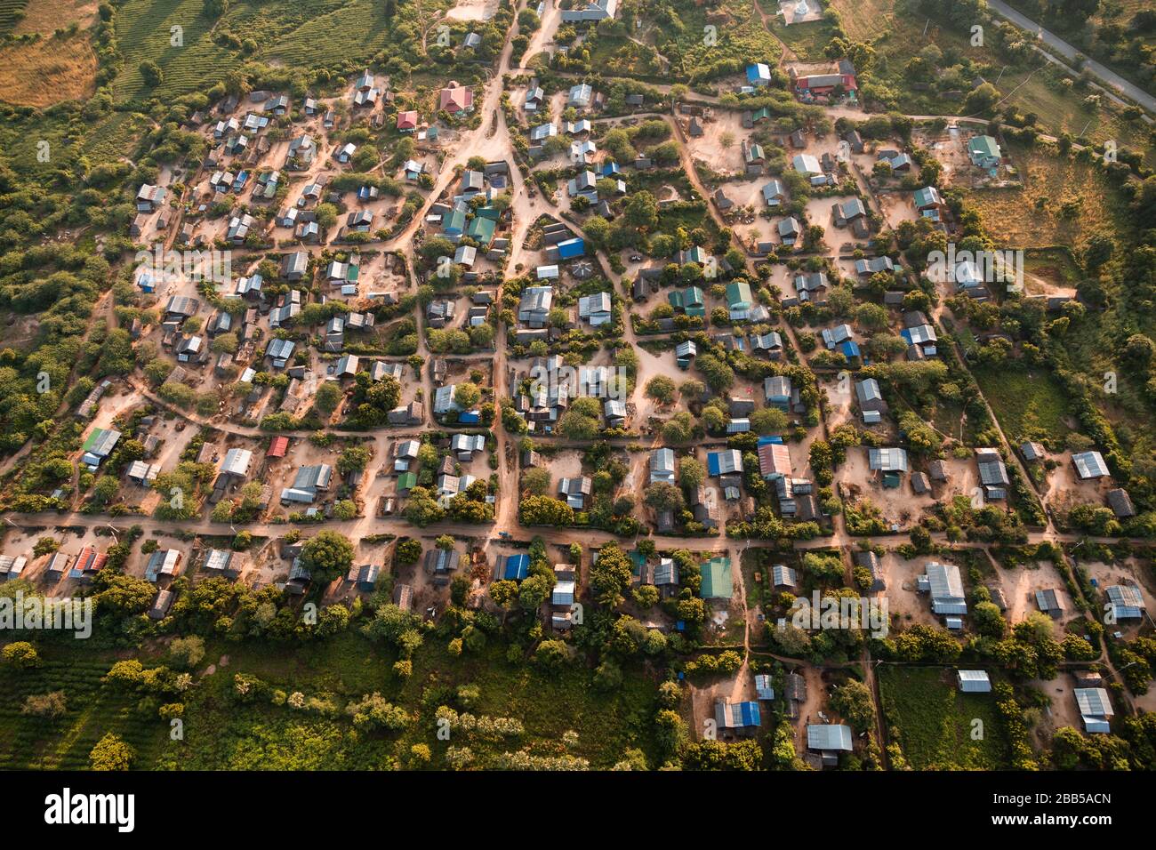 Small village in Myanmar near Bagan in the morning, view from hot air baloon. Stock Photo