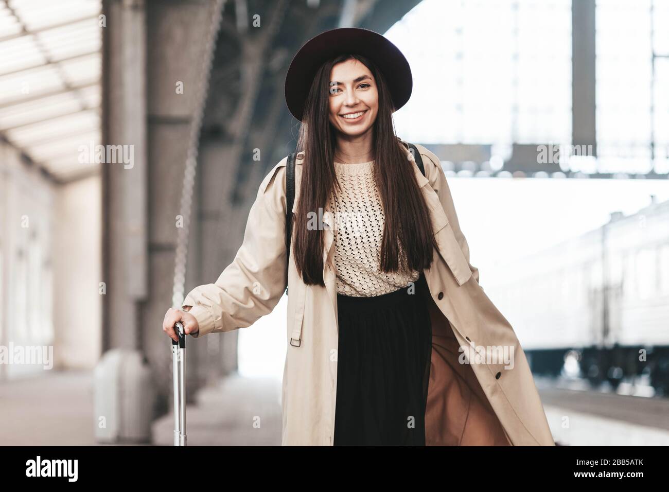 beautiful woman traveler in casual coat 
