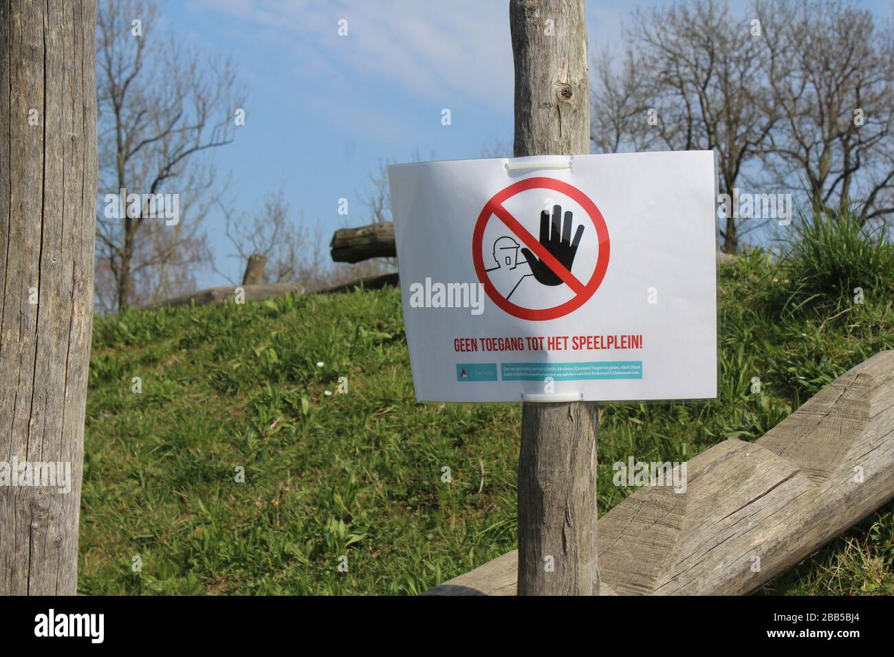 AALST, BELGIUM, 28 MARCH 2020: Sign stating in Dutch  'no access to the playground', after childrens playgrounds were closed in Belgium in response to Stock Photo
