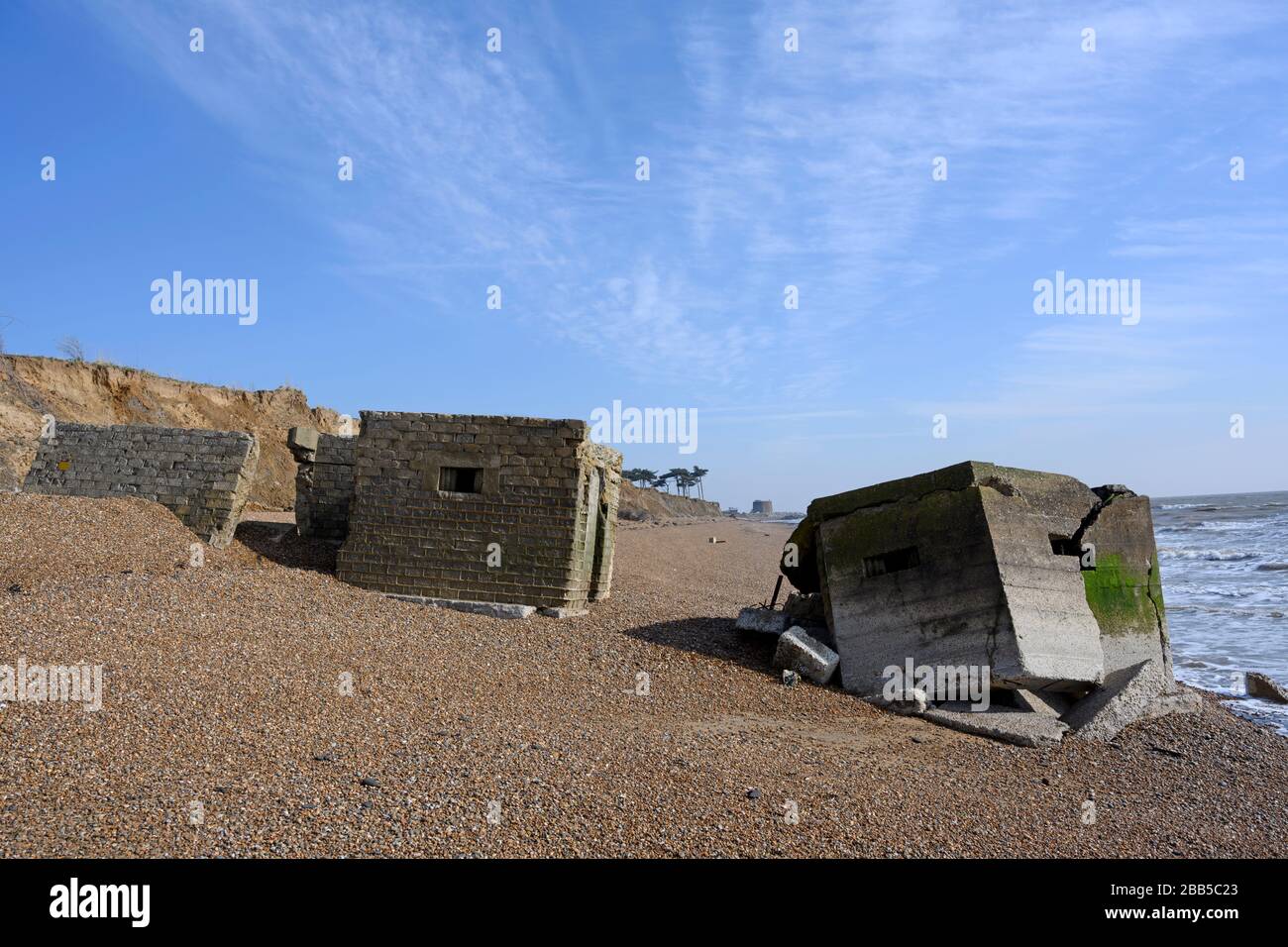 World War Two bunker on a beach due to coastal erosion, Bawdsey, Suffolk, England. Stock Photo
