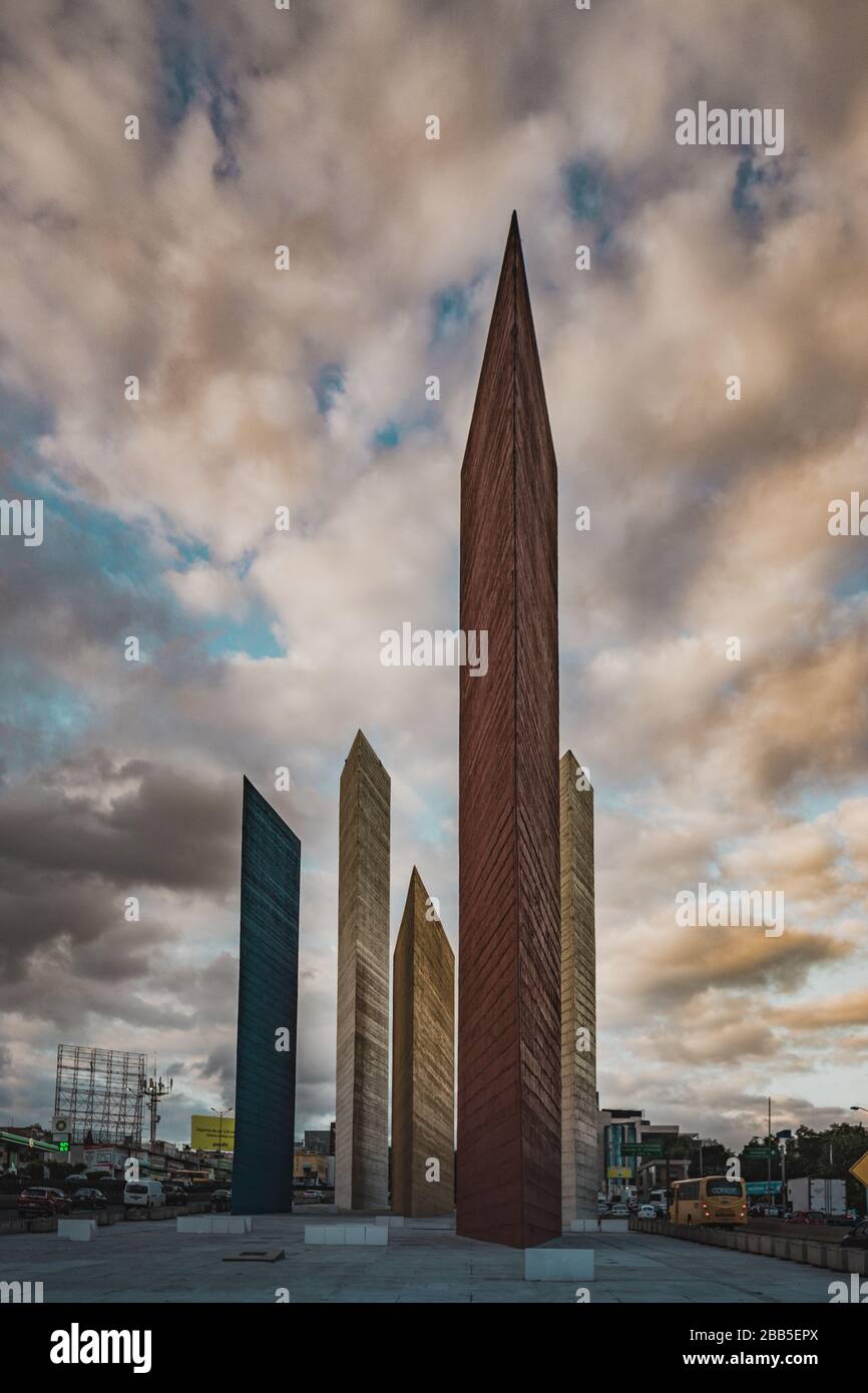 Torres de Satelite (Satellite Towers) monument landmark. Five iconic triangular towers along the highway traffic. Stock Photo