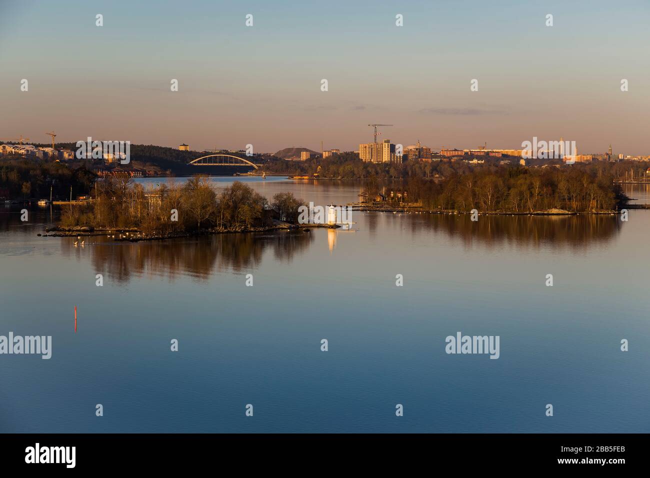 The suburbs of Stockholm and Lake Malaren in the rays of the rising sun Stock Photo