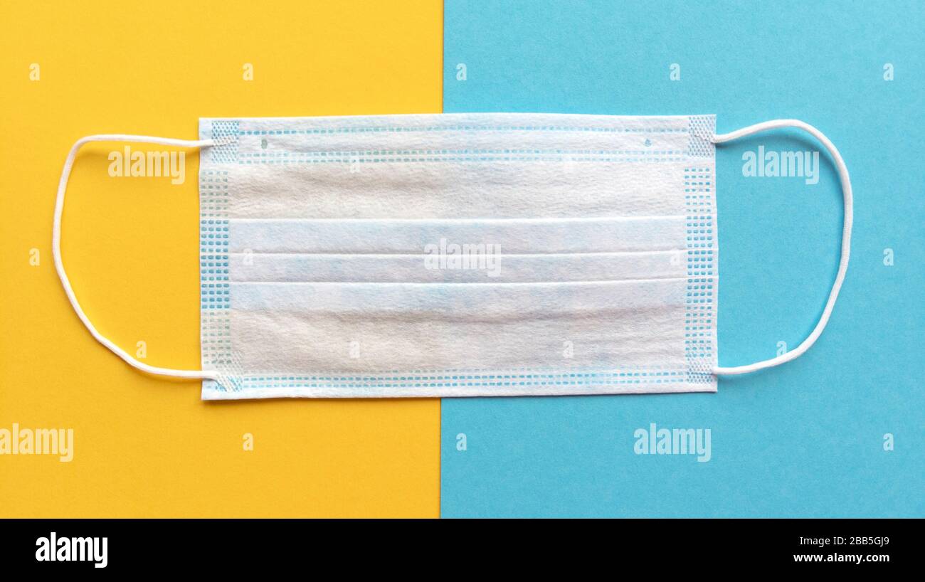 Download Medical Mask On Yellow And Blue Background Simple Flat Lay Medical Concept Stock Photo Stock Photo Alamy PSD Mockup Templates