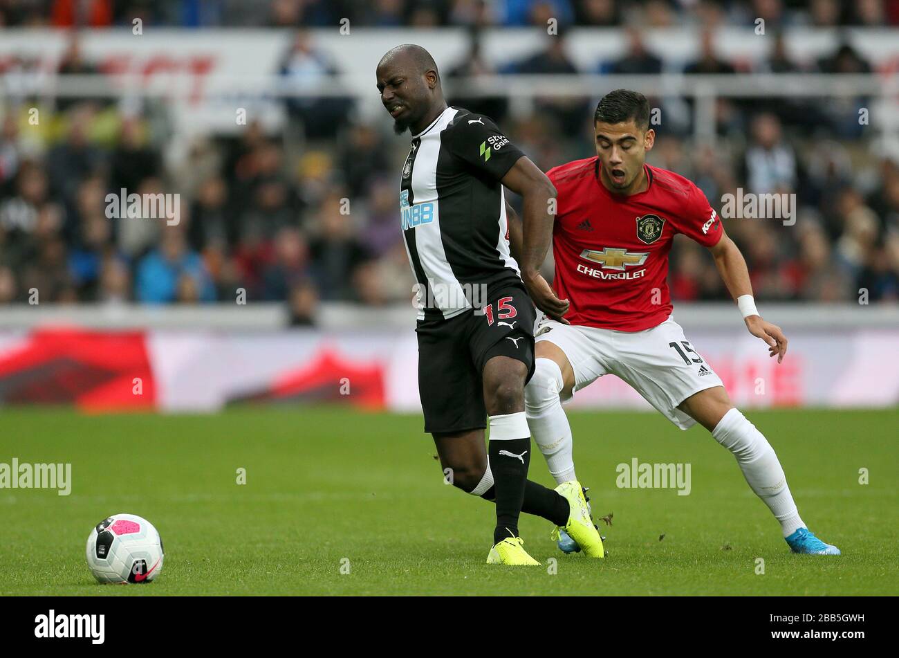 Newcastle United's Jetro Willems (left) and Manchester United's Andreas Pereira battle for the ball Stock Photo