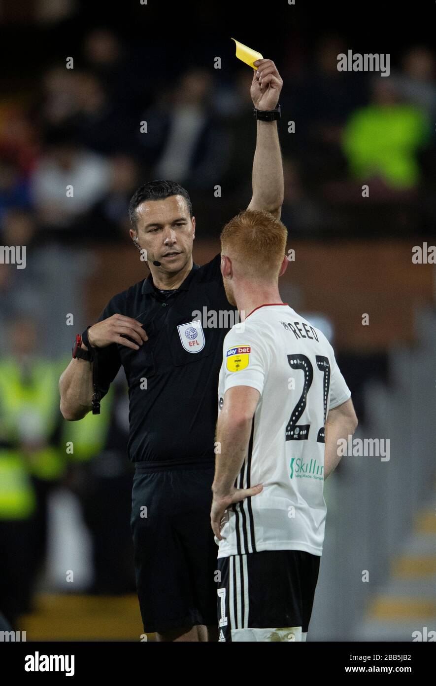 Harrison Reed of Fulham is shown a yellow card Stock Photo Alamy