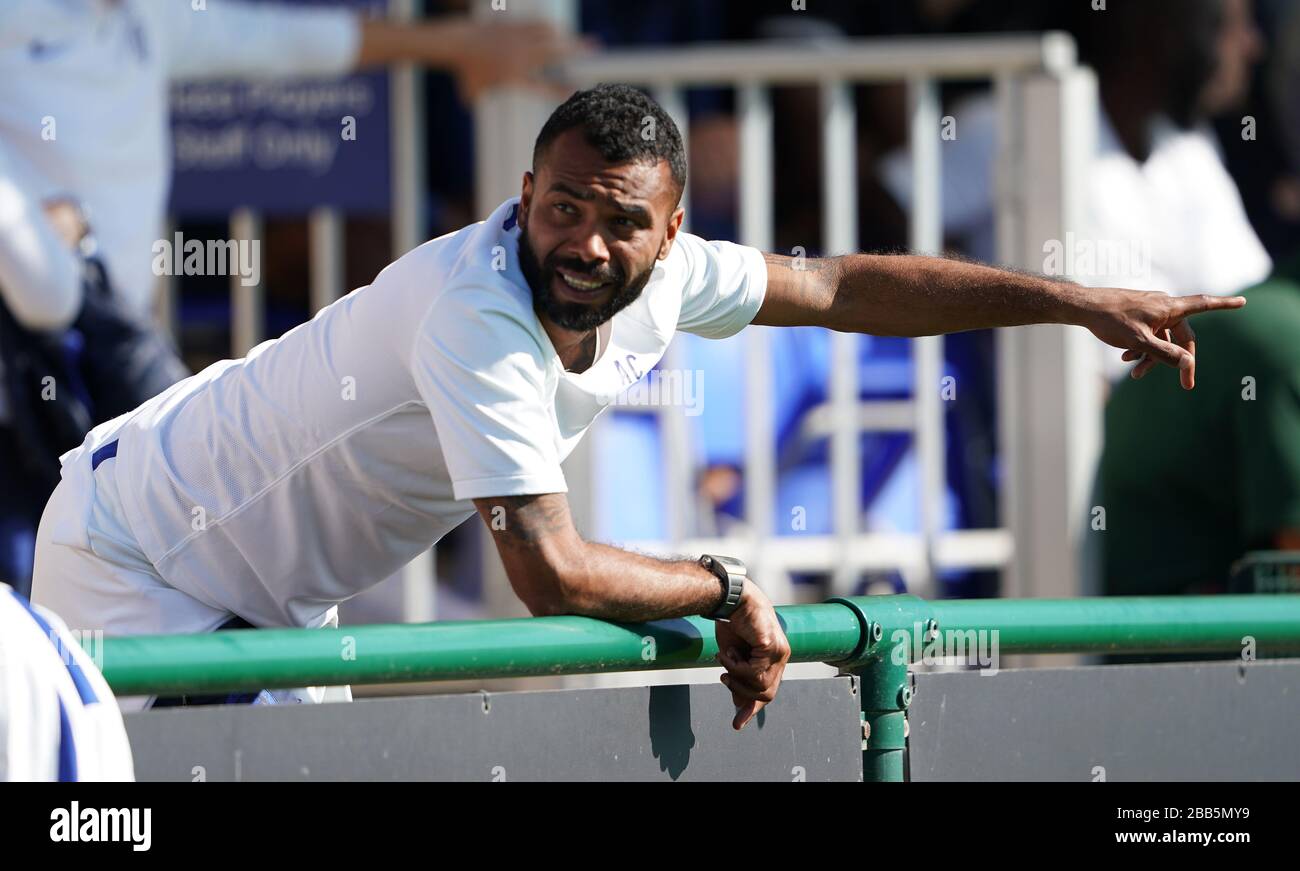 Ashley Cole watches on from the stands Stock Photo