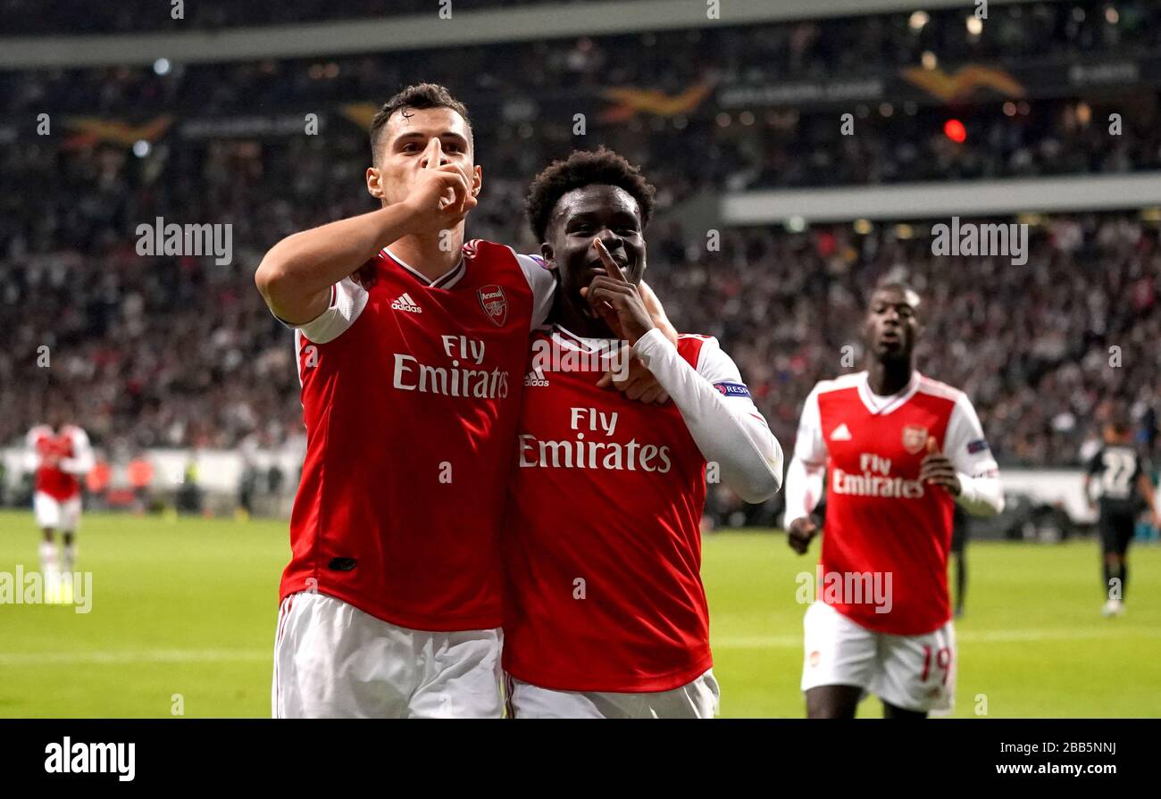 Arsenal's Bukayo Sako (right) celebrates scoring his side's second goal