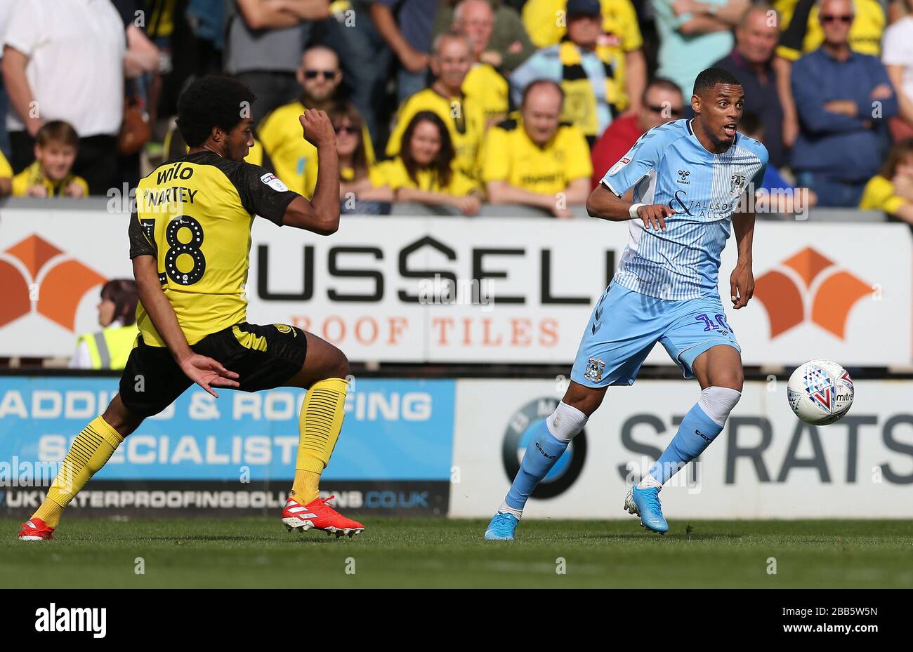 Burton Albion's Richard Narty and Coventry City's Wesley Jobello during the Sky Bet League One match at the Pirelli Stadium Stock Photo
