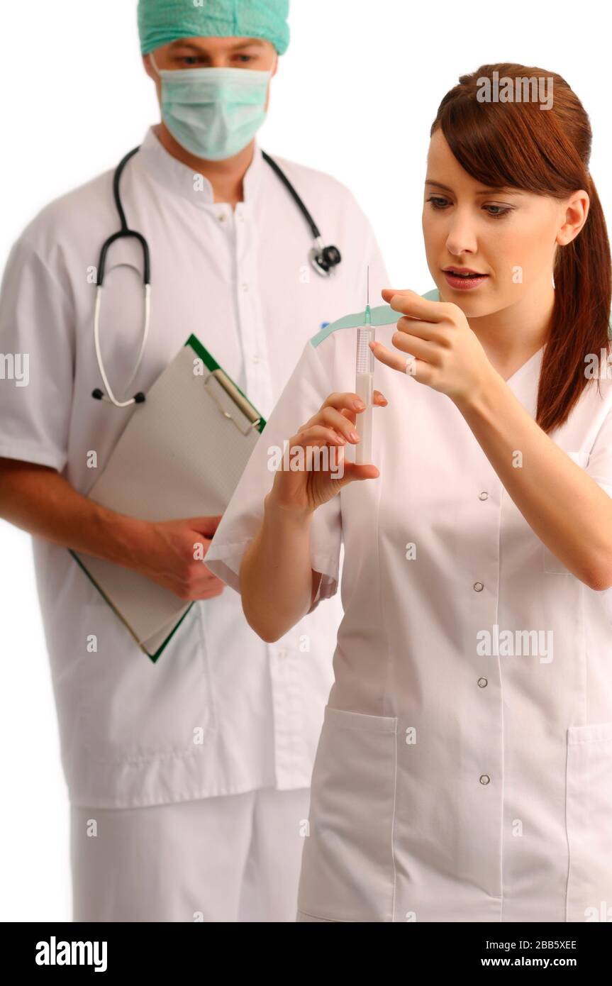 Doctor checking nurse with an injection . (CTK Photo/Vojtech Vlk Stock ...
