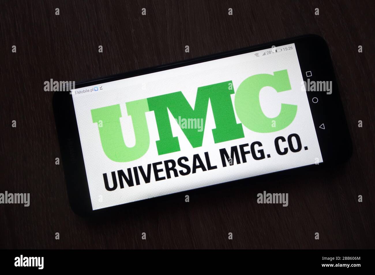 Universal Mfg. Co. (UMC) logo displayed on smartphone Stock Photo