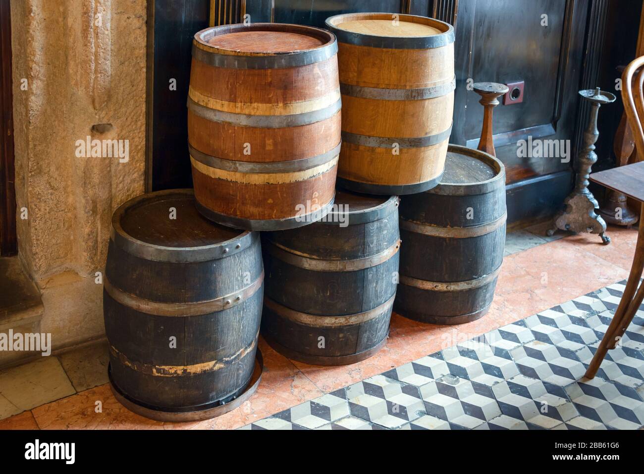 Oak barrels for storing wine, liquor and beer. Old wooden barrel with
