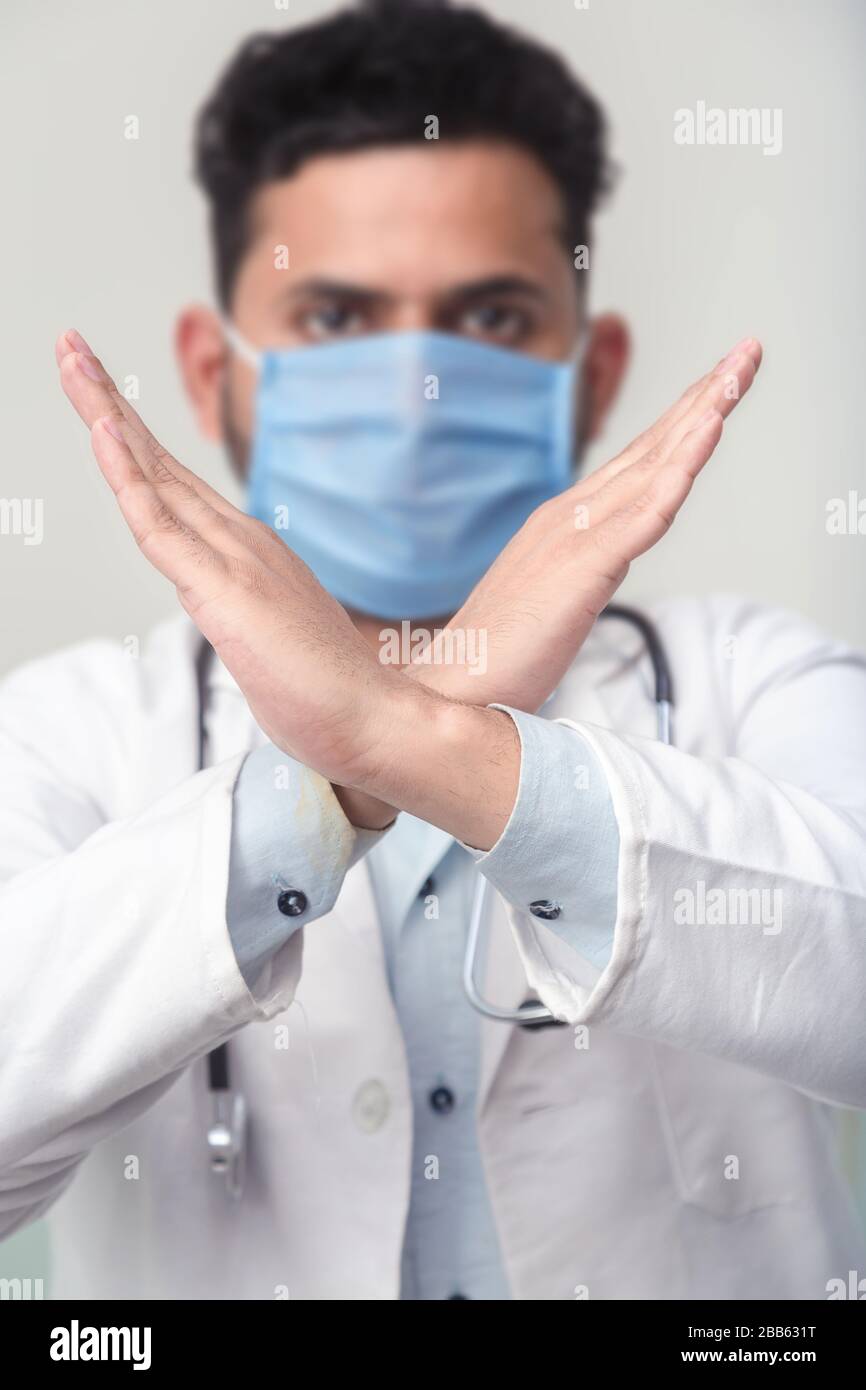 Portrait of Asian medical male Doctor wear a mask to prevent germs and