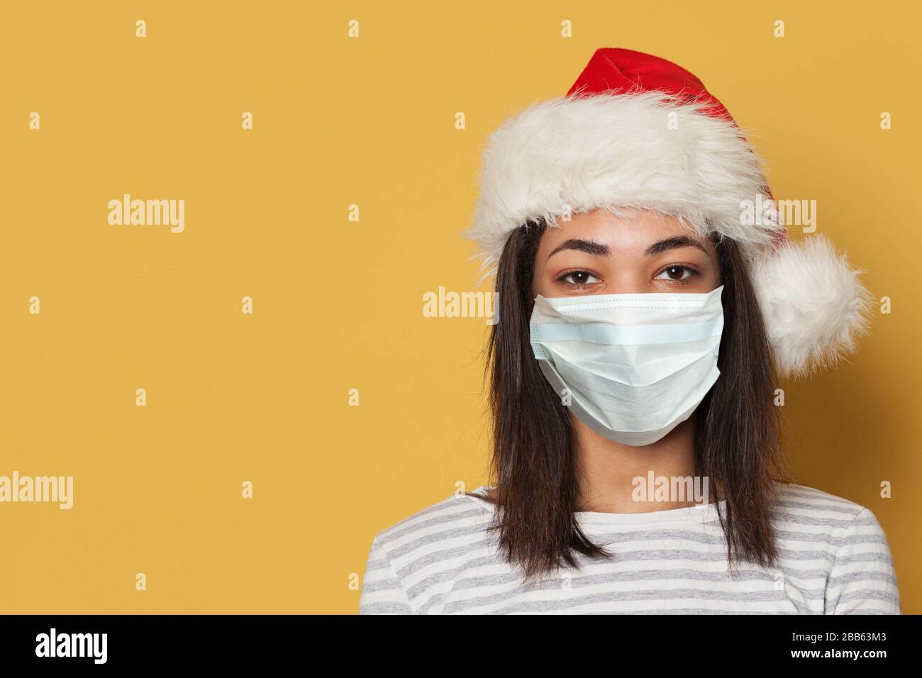 Black student wearing mask hi-res stock photography and images - Alamy