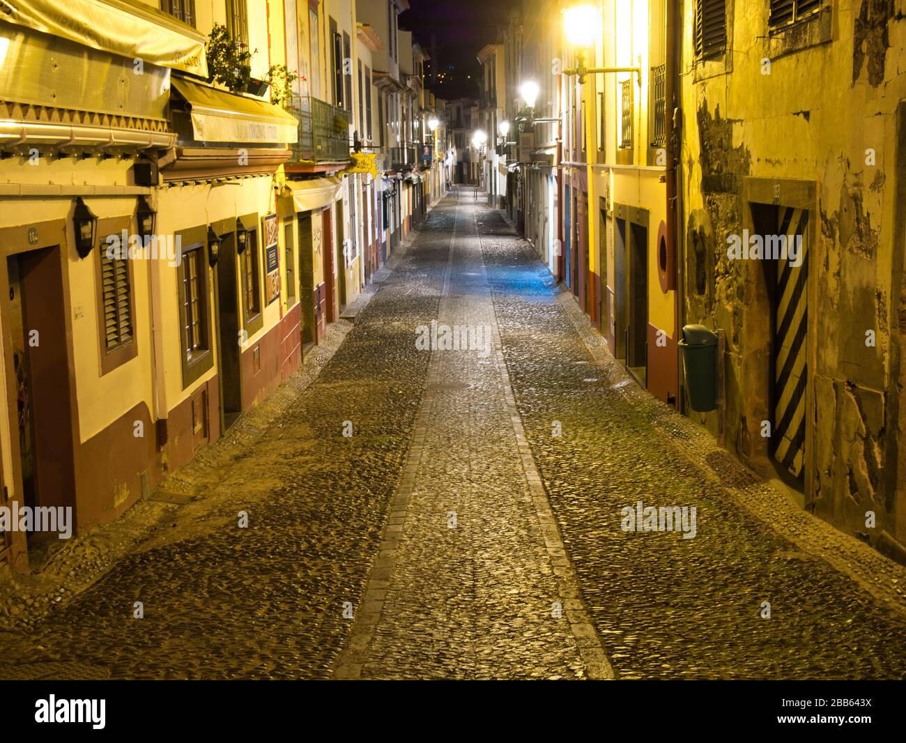 A evening view of the Rua de Santa Maria in Funchal - normally busy with holidaymakers, but deserted because of the coronavirus health emergency Stock Photo