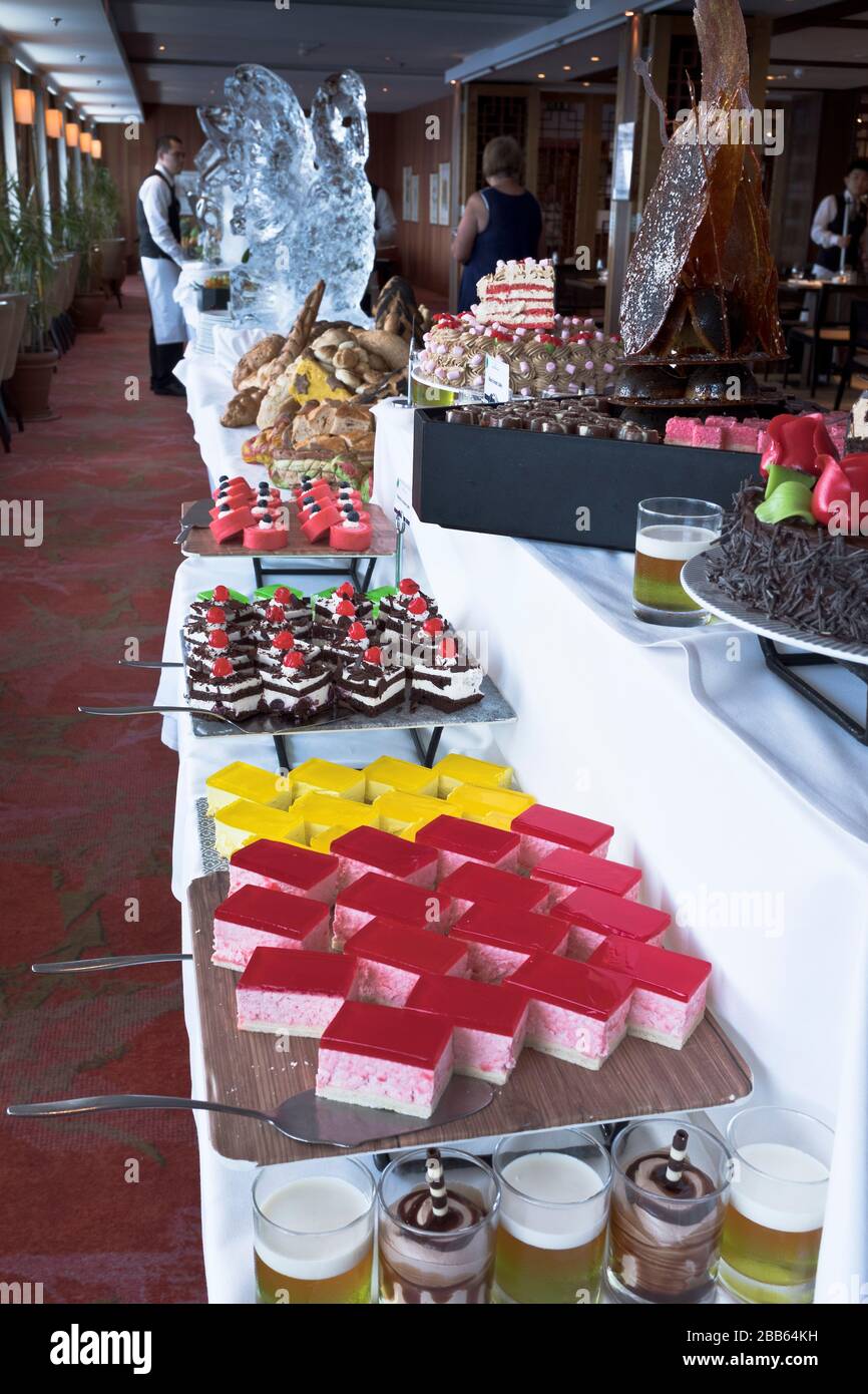 dh Cruise ship food MS BOUDICCA FRED OLSEN Sweet puddings table displayed for buffet Stock Photo