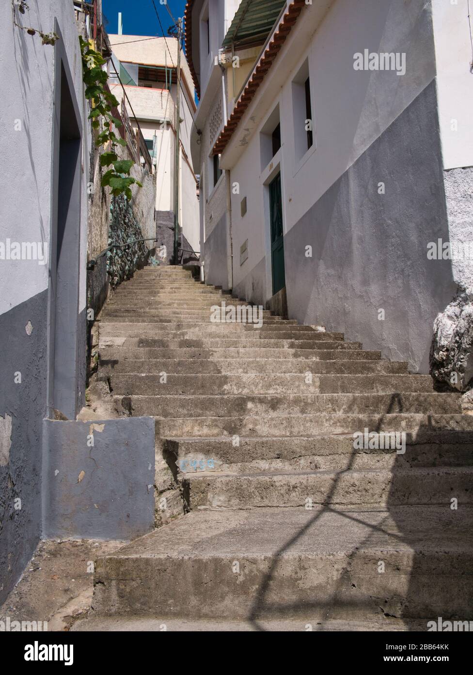 Steep, narrow, concrete steps on the Travessa da Ribeira de João Gomes ...