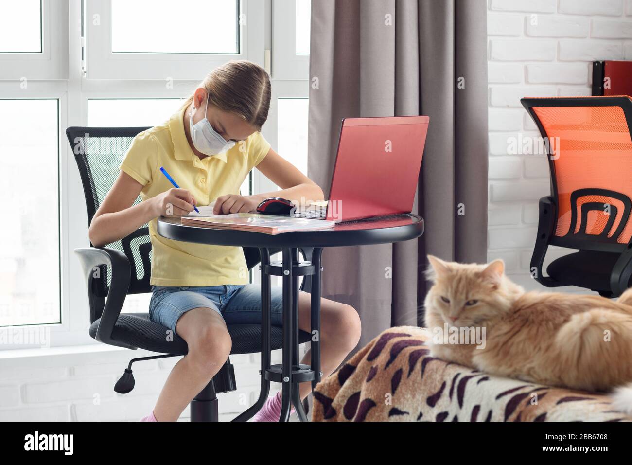 Ill girl schoolgirl studies online via computer Stock Photo - Alamy