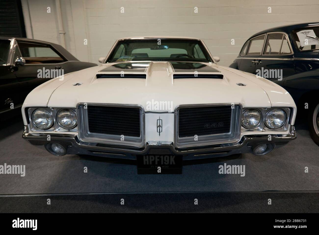Front view of a White, 1971,  Oldsmobile 442 Muscle Car, on display at the 2020 London Classic Car Show Stock Photo