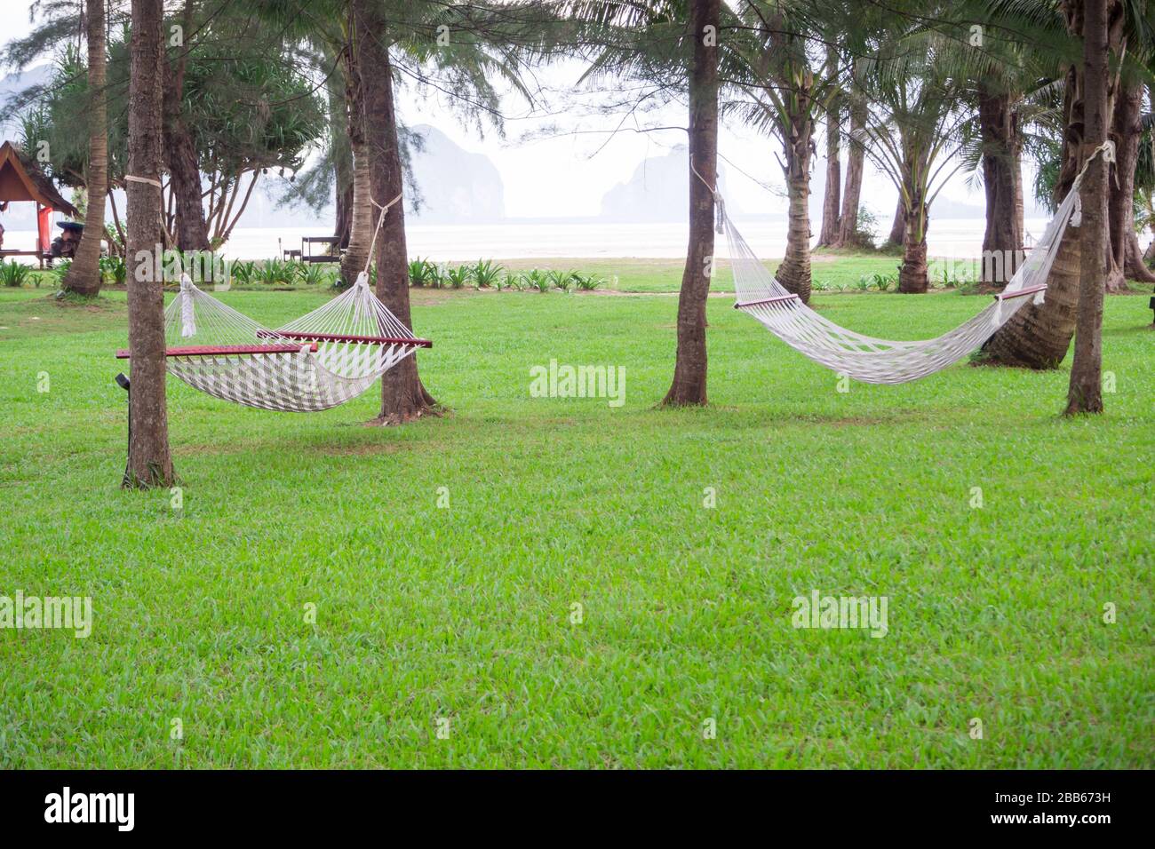White cradle in the green lawn Stock Photo Alamy