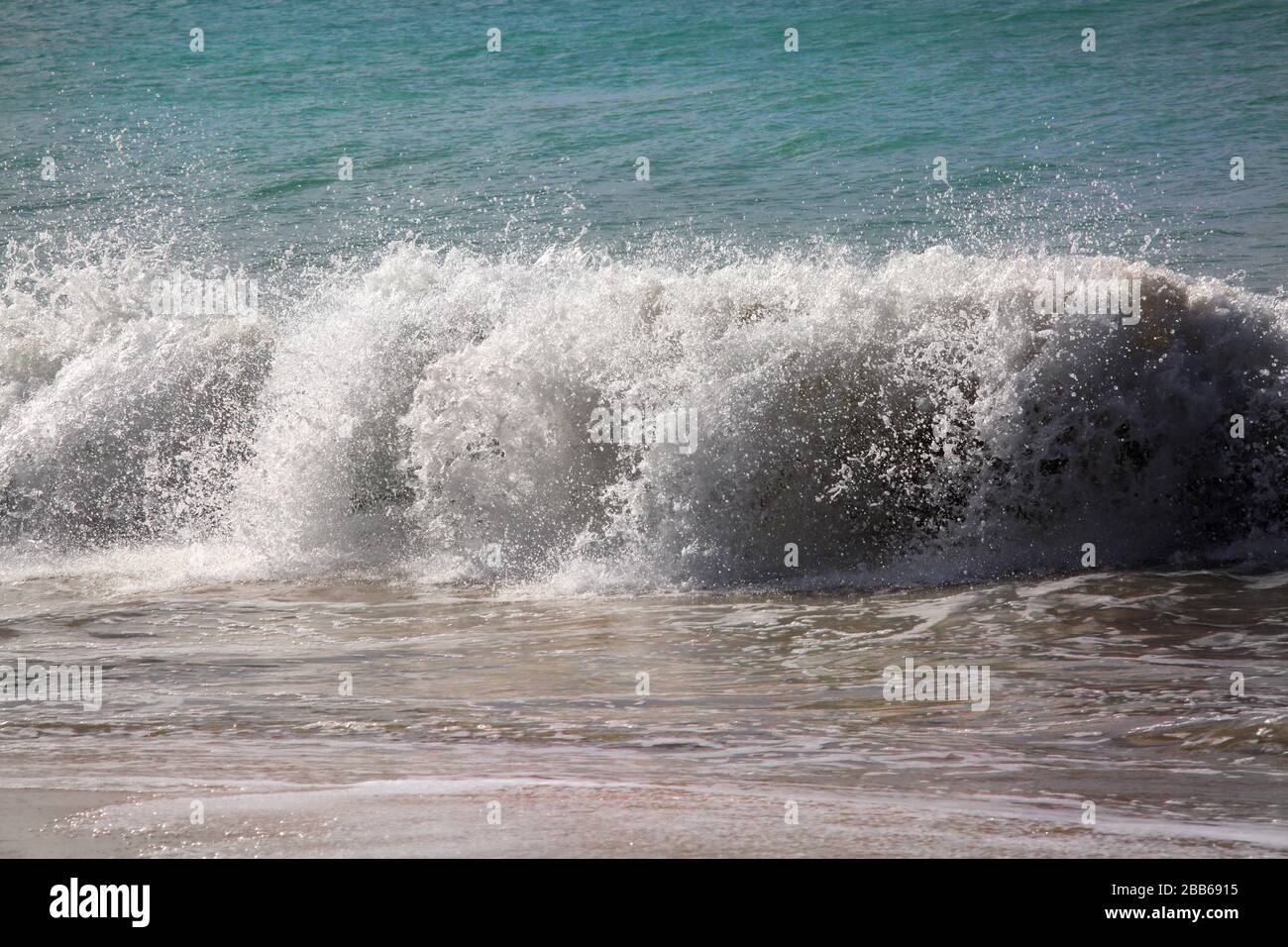Grand Anse Beach Grenada waves Breaking on Shore Stock Photo