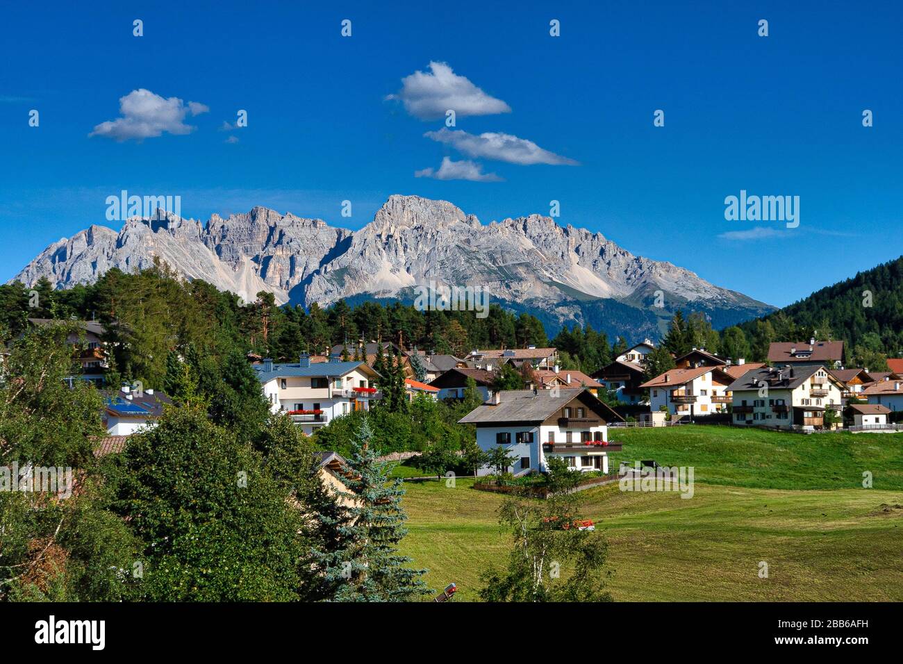 Nova Ponente village and Latemar mountain range, South Tyrol, Italy Stock Photo