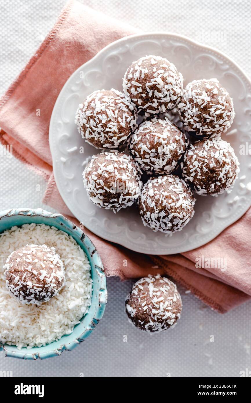 Coconut, nuts and dates energy balls Stock Photo