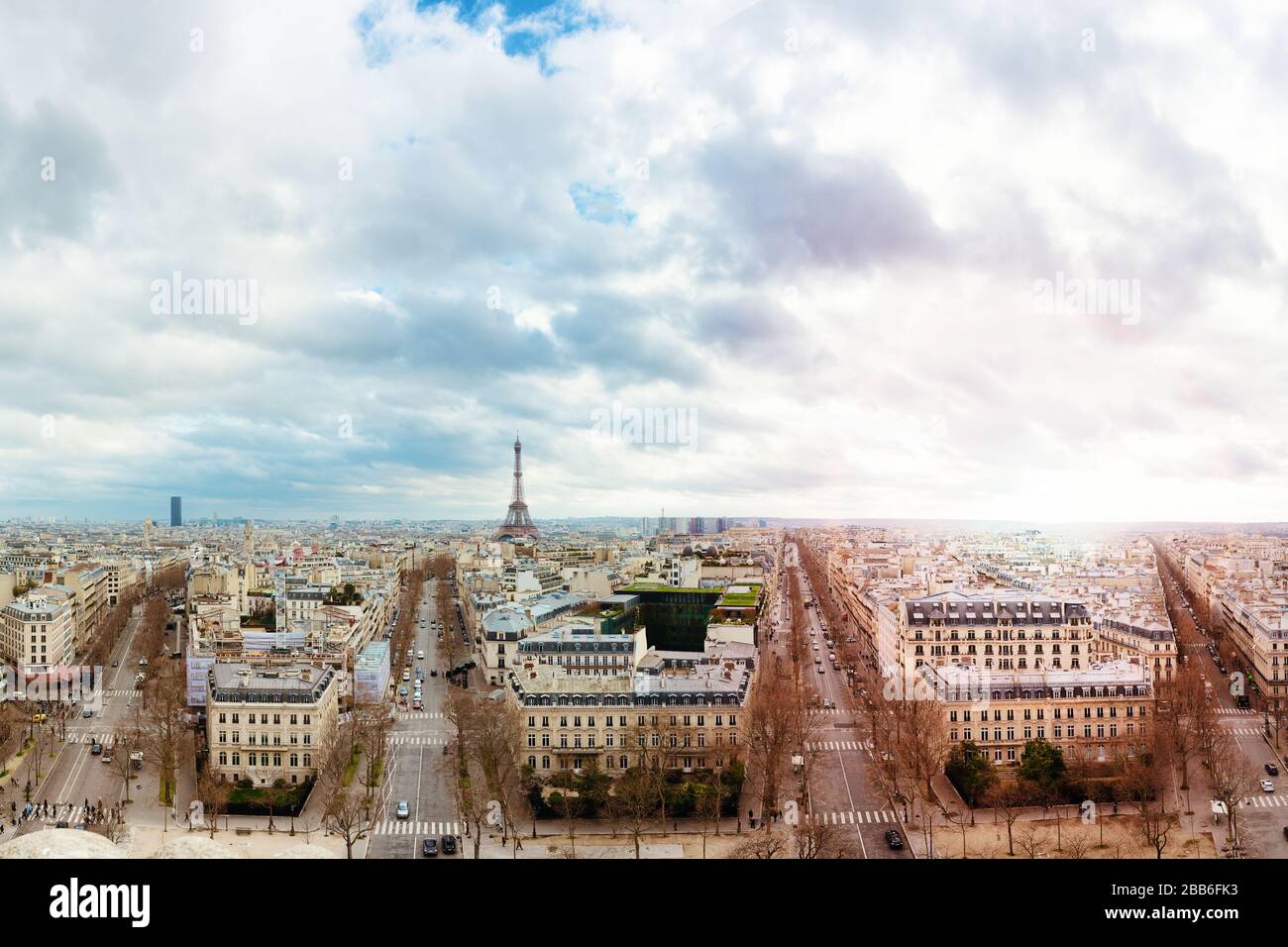 Panoramic urban skyline of Haussmanian buildings and Eiffel Tower in the city of Paris, France Stock Photo