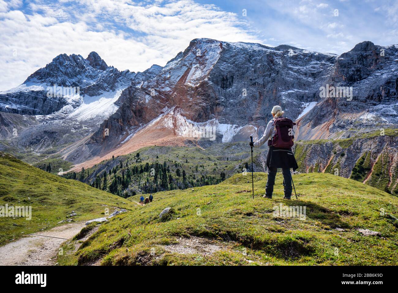 Woman hiking in Dolomites, Fanes-Sennes-Braies Nature Park, South Tyrol, Italy Stock Photo