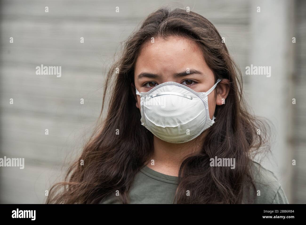Concerned Child Wearing Mask Stock Photo Alamy