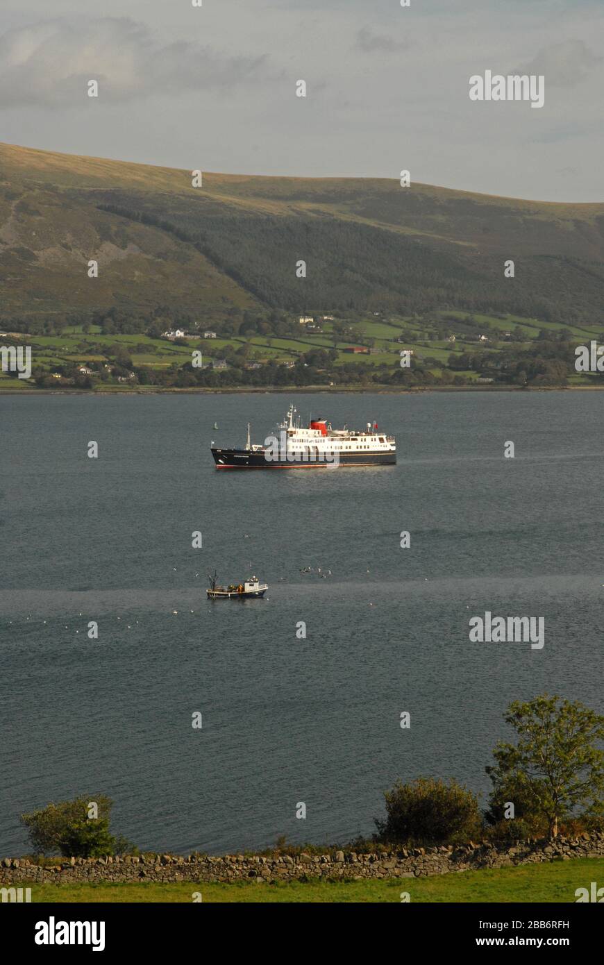 HEBRIDEAN PRINCESS arriving at anchor off CARLINGFORD MARINA as a small