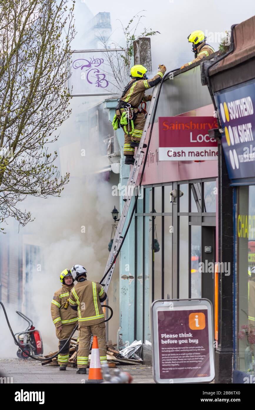 Hamlet Court Road, Westcliff on Sea, Essex, UK. 30th March 2020. A fire next to a Sainsbury’s supermarket has created unwelcome issues during the COVID-19 Coronavirus pandemic. It required the attendance of a large number of emergency services, has affected one of the largest food suppliers in the area and has attracted groups of people not complying with social distancing guidelines. A spokesman for Essex Police said: 'We were called following a fire within a shop at around 5pm. While carrying out a search of the property over 500 cannabis plants were found' Stock Photo