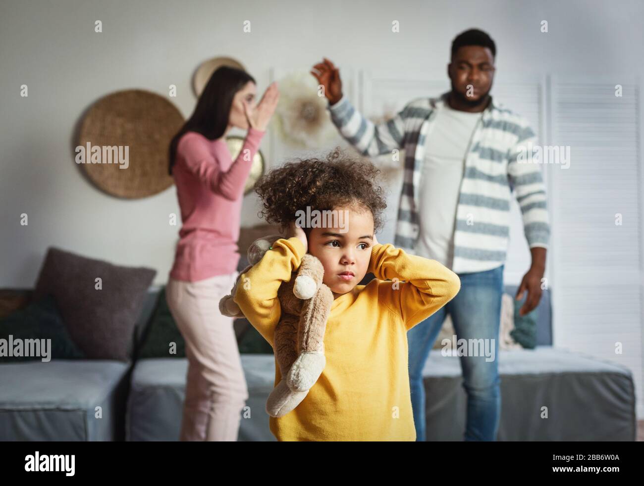 International family breaks up, child covers ears Stock Photo Alamy