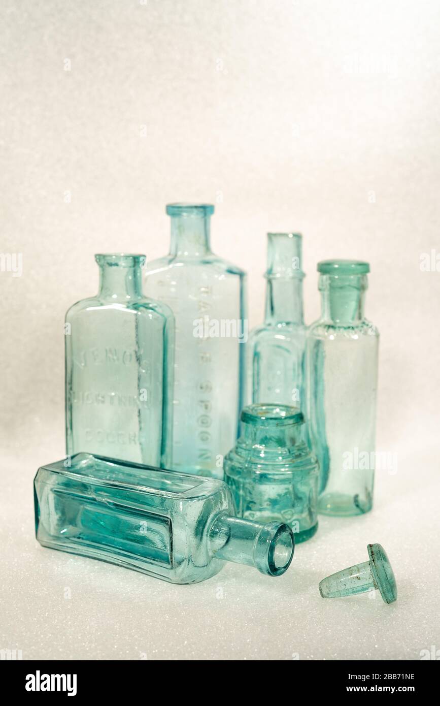 Vintage blue glass bottles of various shapes and sizes - still life Stock Photo