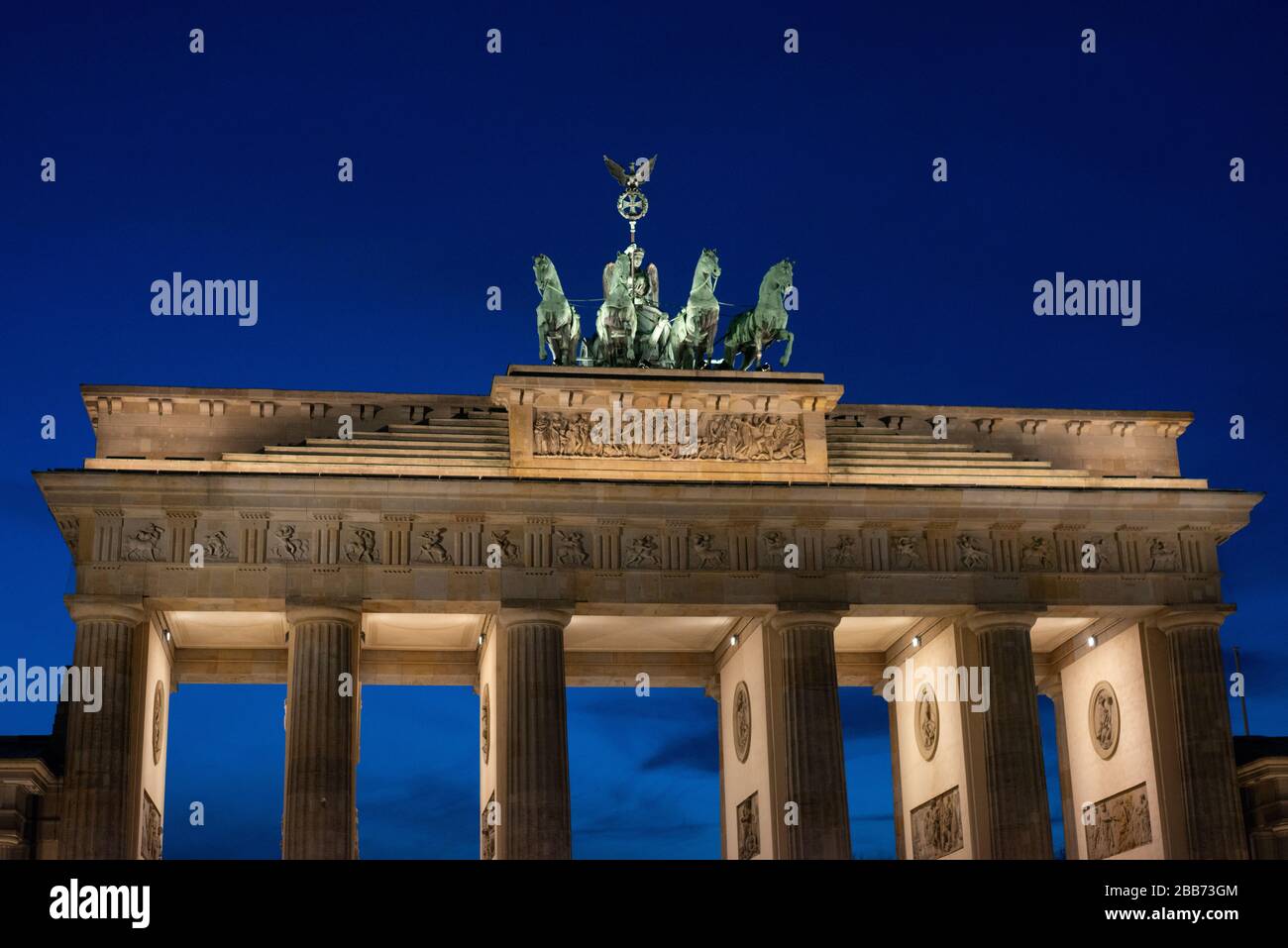 The Brandenburg Gate in Berlin at Night Stock Photo