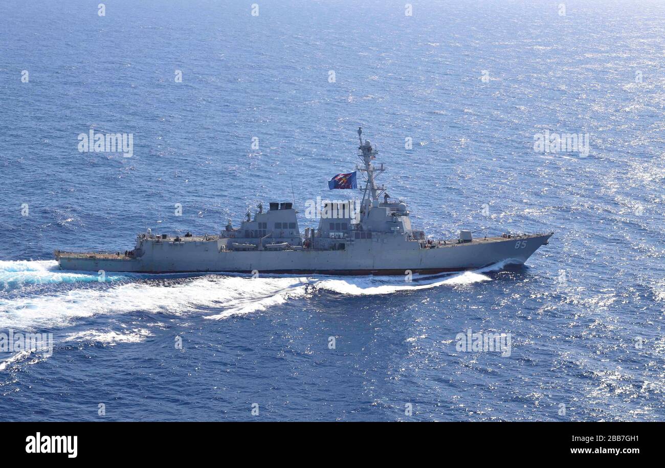 The U.S. Navy Arleigh Burke-class guided-missile destroyer USS McCampbell conducts a routine transit March 12, 2020 in the South China Sea. Stock Photo