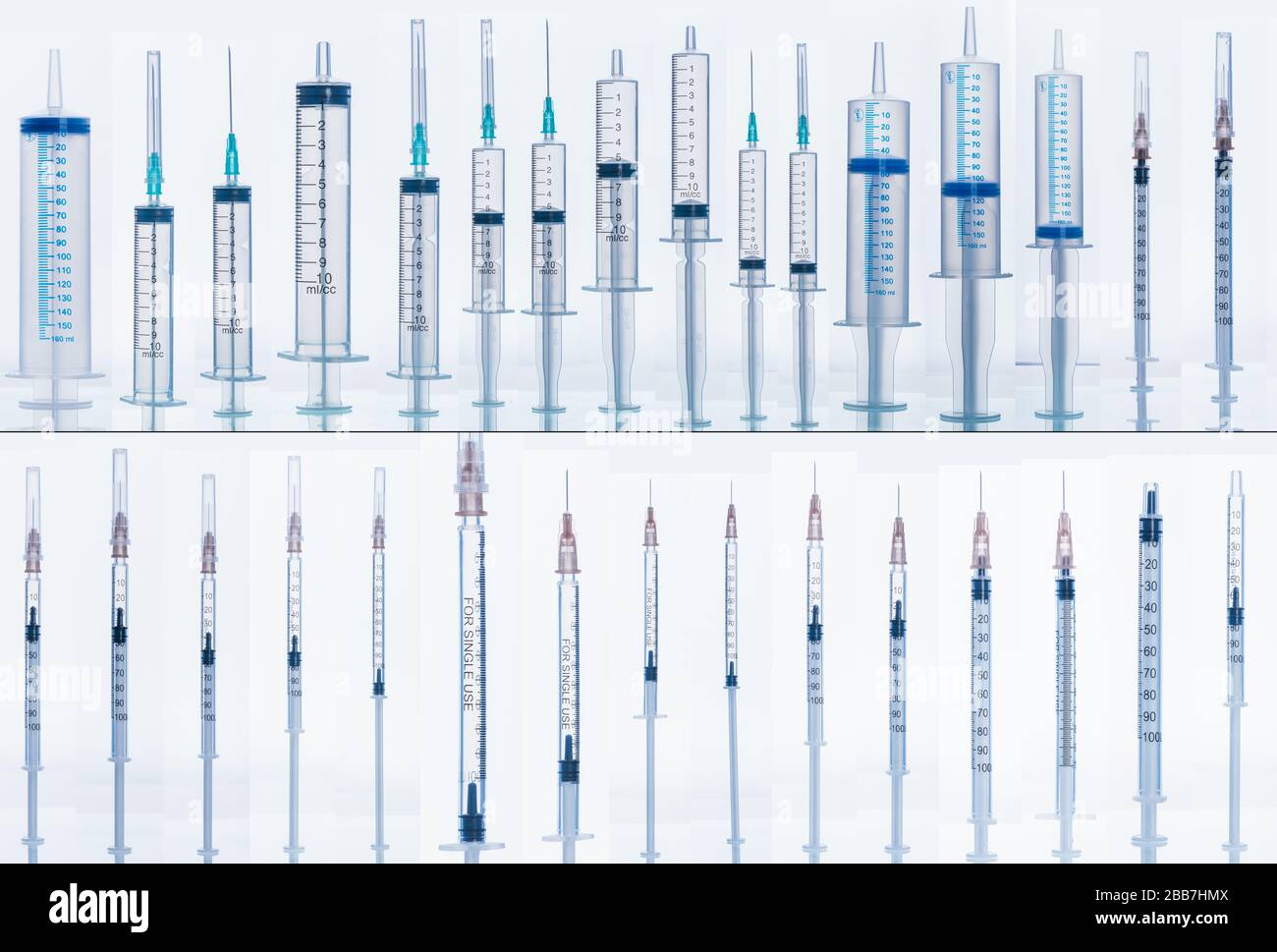 Medical Syringe with needle isolated on white, macro. Many different syringes in different positions with and without liquids. Stock Photo